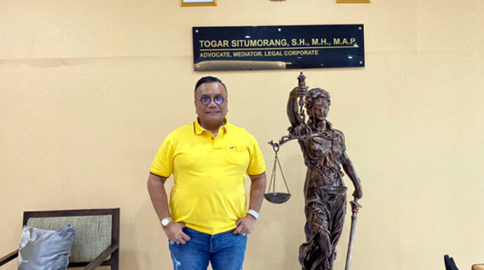 Totalitas Law Firm Togar Situmorang Perjuangkan Keadilan Klien Kasus Arisan Online